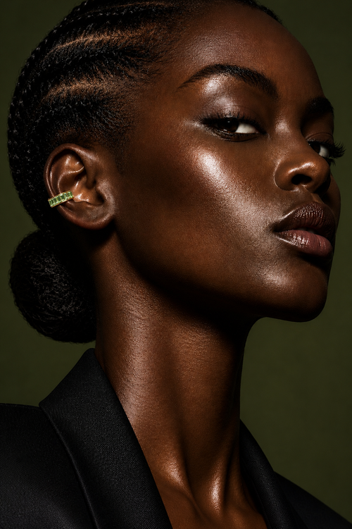 Close-up of a woman's face with a dark background