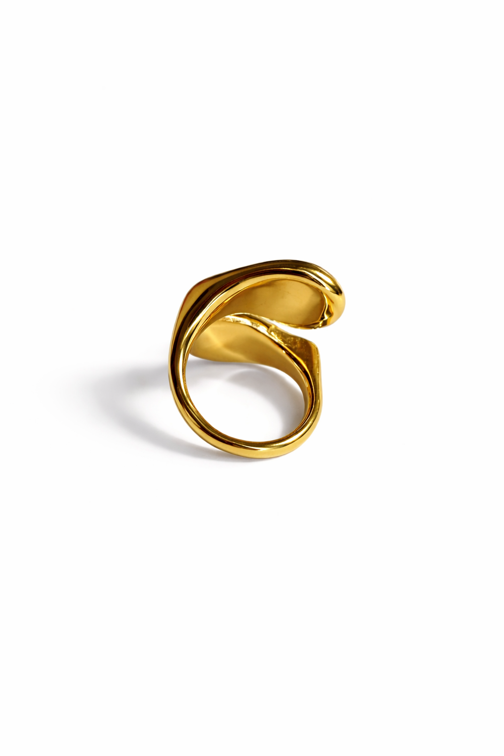 Gold ring on a white background