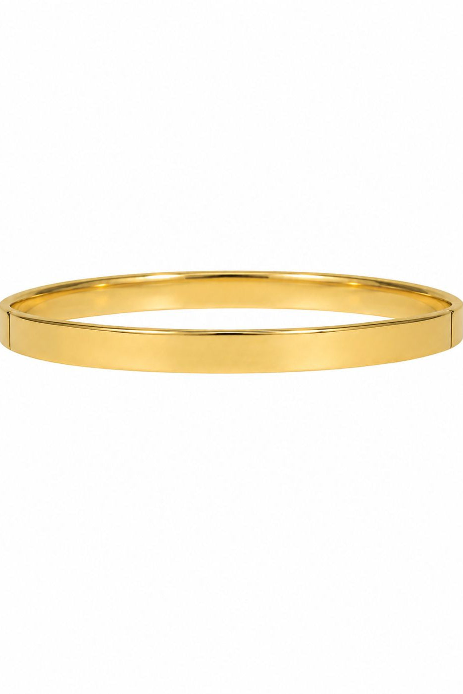 Gold bangle on a white background