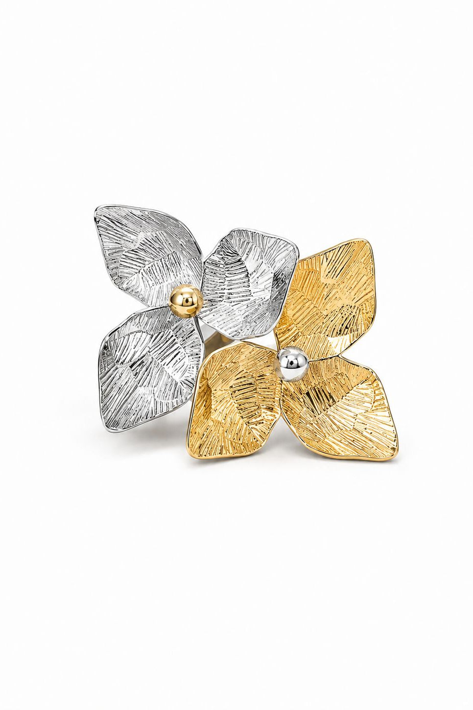 Pair of silver and gold earrings on a white background