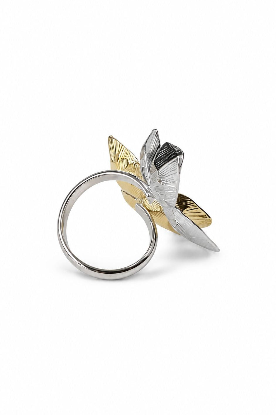 Silver ring with a unique design on a white background