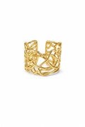 Gold lace ring on a white background