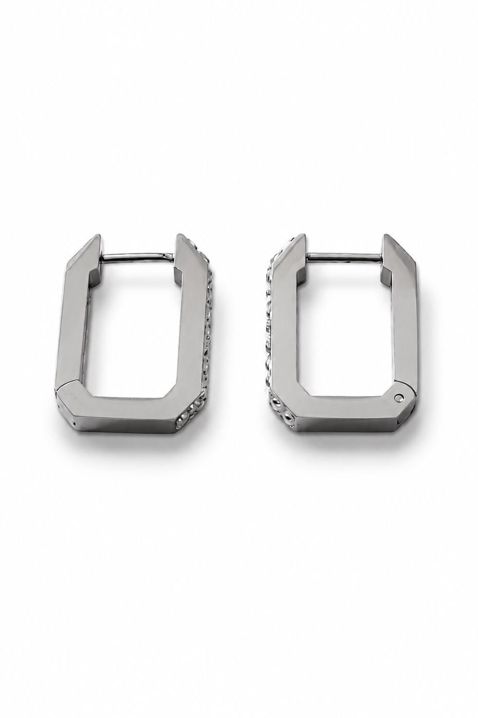 Pair of silver-tone hoop earrings on a white background