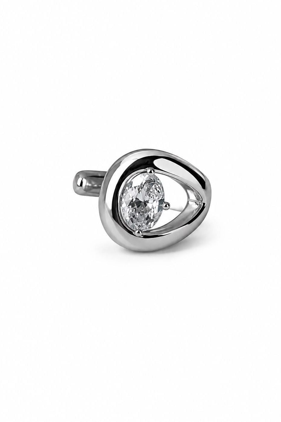 Silver ring with a oval zircon on a white background