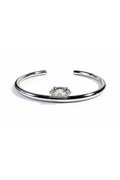 Stainless steel bracelet with a zircom on a white background