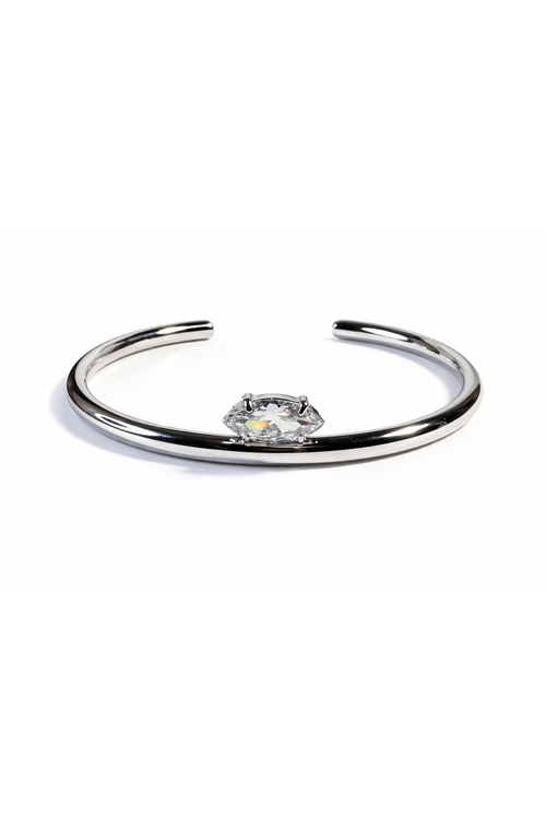 Stainless steel bracelet with a zircom on a white background