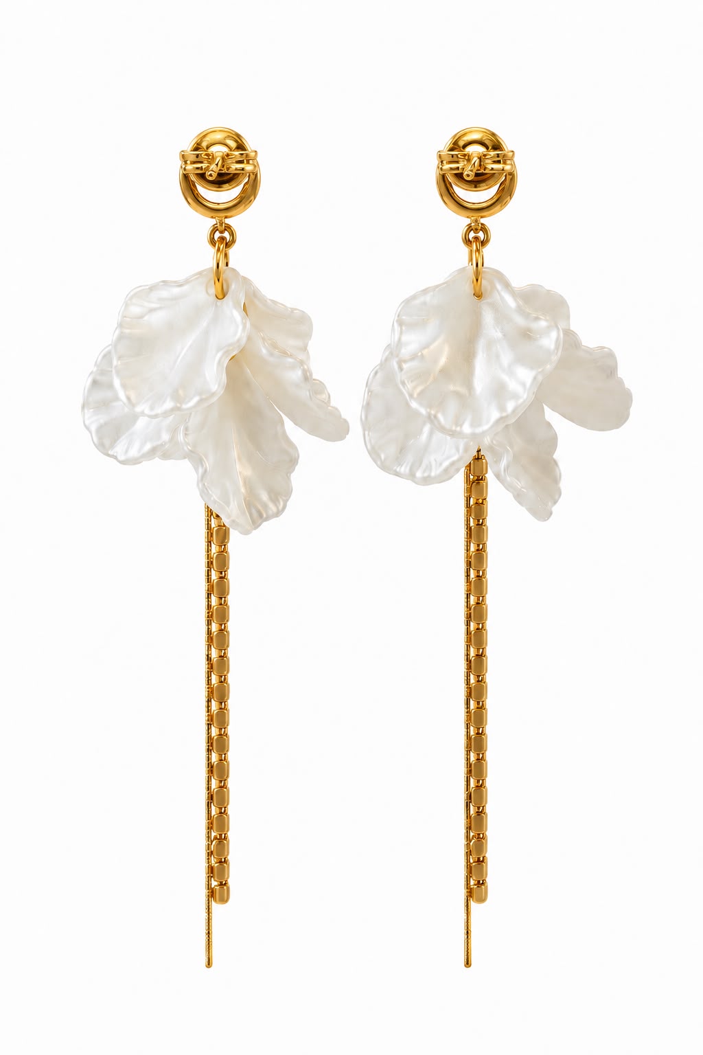 Pair of earrings with white floral elements and gold chains on a white background