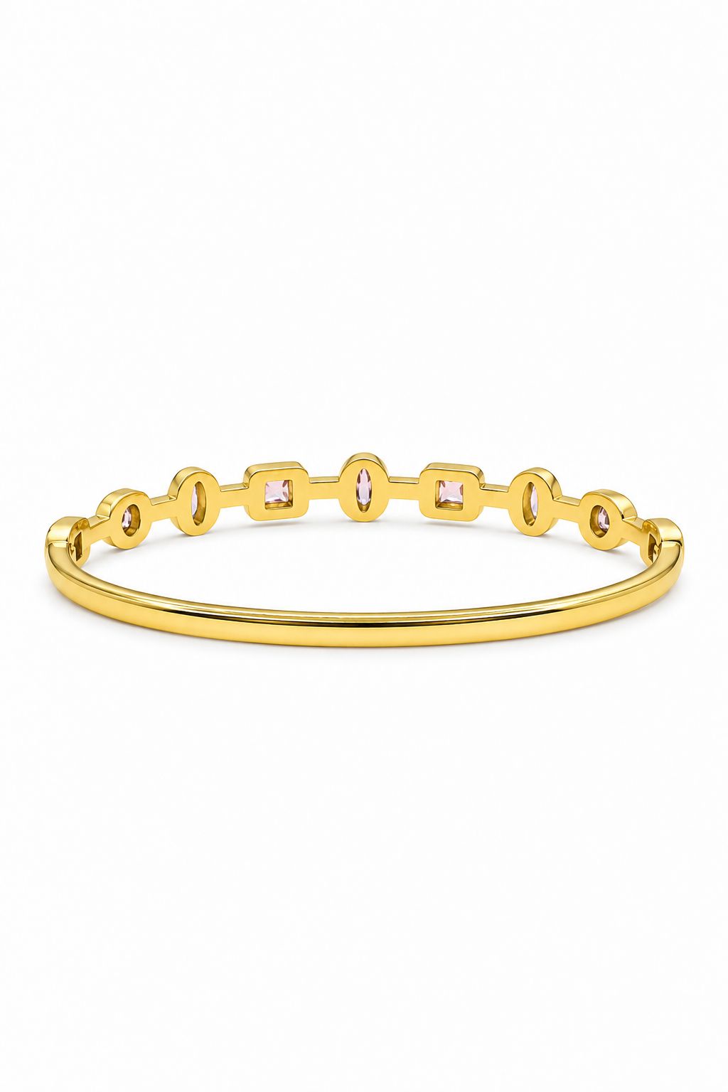 Golden bracelet back with pink gemstones on a white background