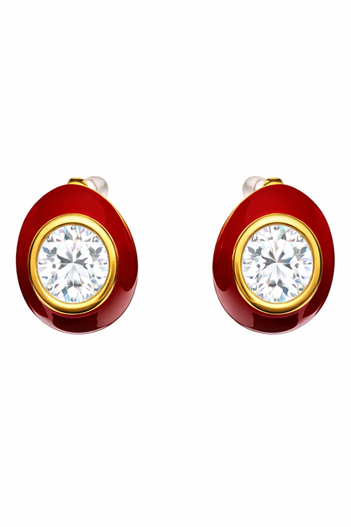 Red and gold earrings with zircon on a white background