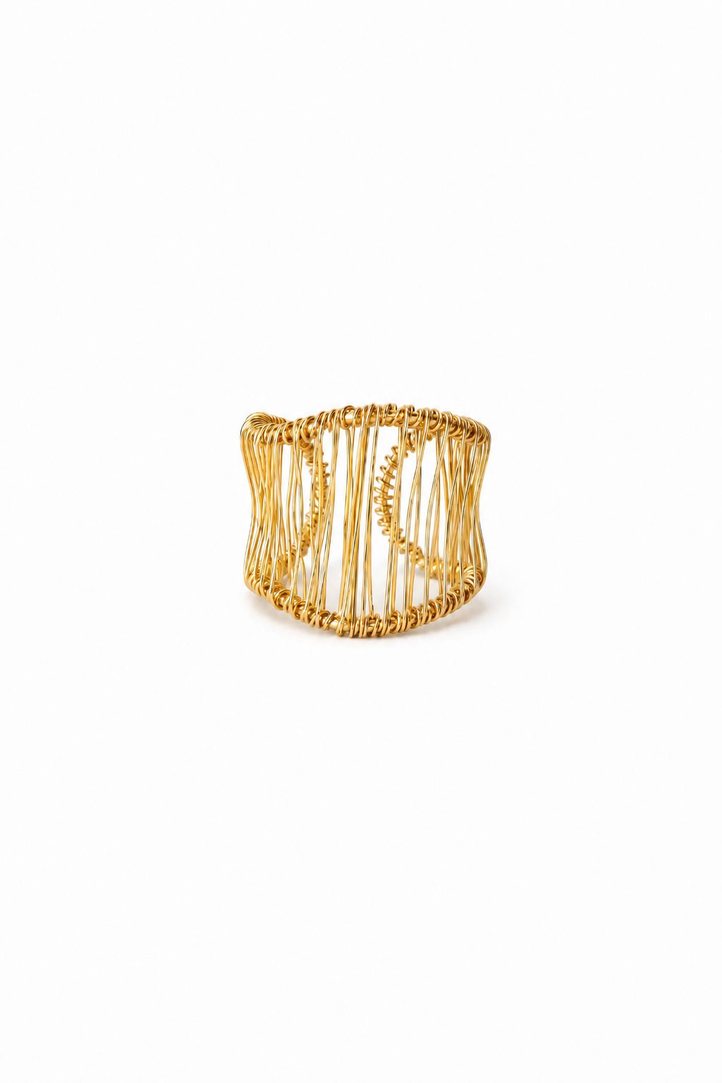 Golden adjustable ring on a white background